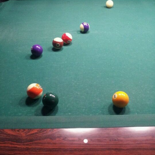 Photo taken at New Wave Billiards by Oscar H. on 2/28/2012