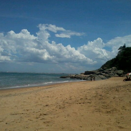 Photo taken at Praia Da Joana by Dede R. on 3/15/2012