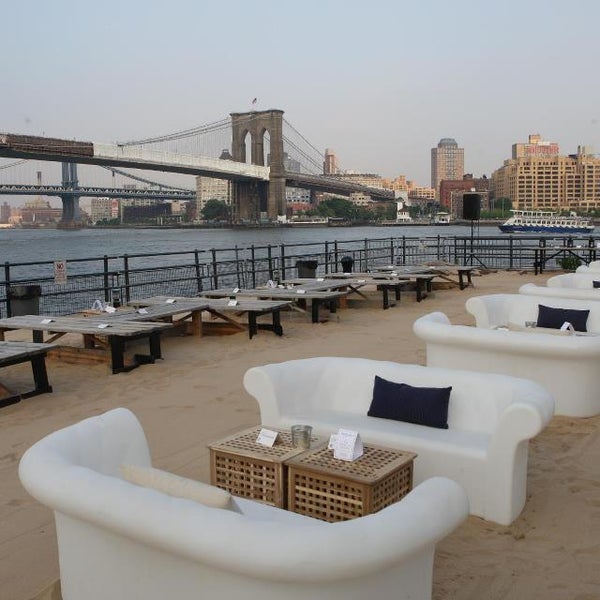 It's time to drink outside: This outdoor drinking spot in the South Street Seaport reopened for the season on Saturday. It's outfitted with a beach, fire pit and Ping-Pong tables.