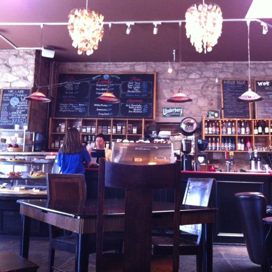 Photo taken at East Village Coffee Lounge by Stephanie G. on 5/21/2012