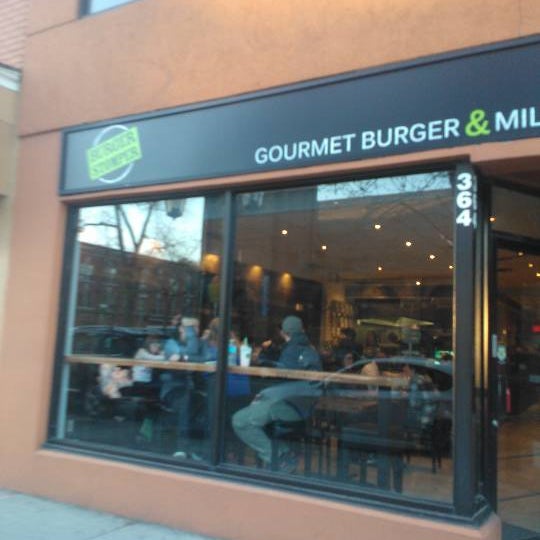 Photo taken at Burger Stomper Gourmet Burger &amp; Milkshake Bar by Doug G. on 4/4/2012