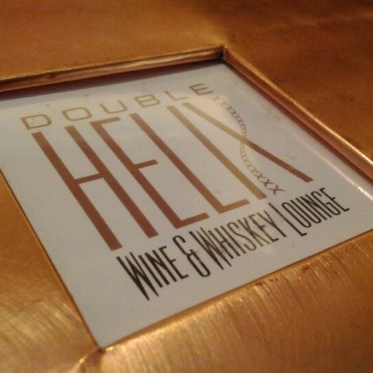 Photo taken at Double Helix Wine &amp; Whiskey Lounge by Caresse V. on 4/9/2012