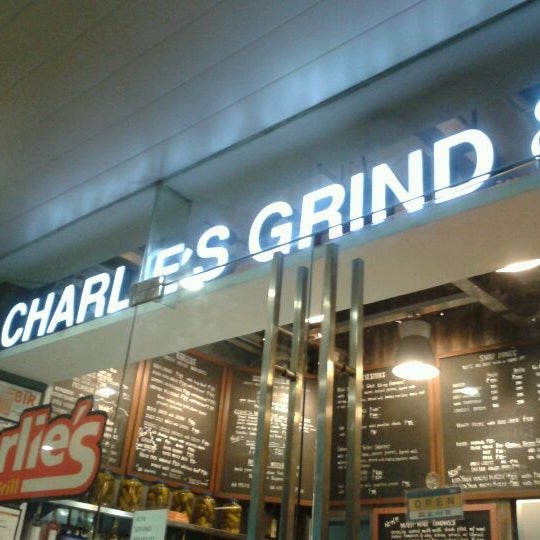 Photo taken at Charlie&#39;s Grind &amp; Grill by Ali S. on 3/1/2012