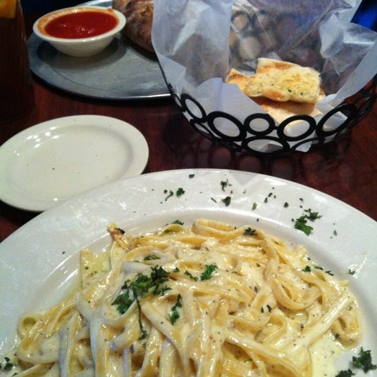 Photo taken at Russo&#39;s Coal-Fired Italian Kitchen by Georgina T. on 3/13/2012