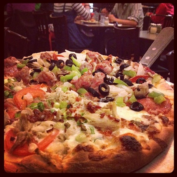 Photo taken at North Beach Pizza by Masatoshi T. on 9/2/2012