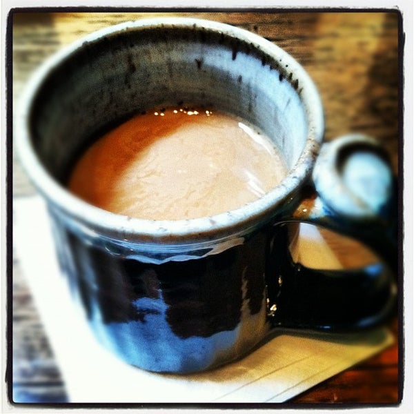 Photo taken at Central Coffee Company by Andrew N. on 3/2/2012