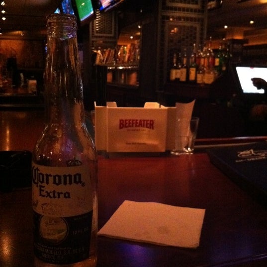 Photo taken at Bar Louie by Mert O. on 3/24/2012