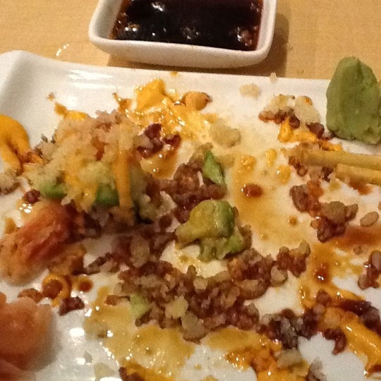 Photo taken at Happy Fish Sushi by Desirae S. on 5/2/2012