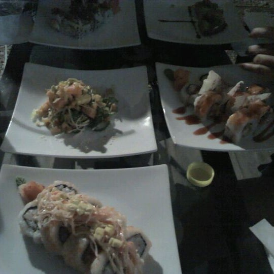 Photo taken at Sushi-Go by Marcos G. on 3/12/2012