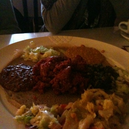Photo taken at Messob Ethiopian Restaurant by An-Chih T. on 3/25/2012