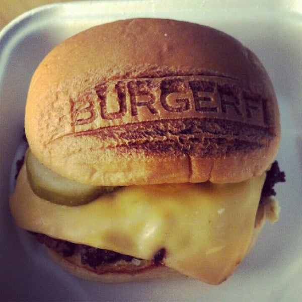 Photo taken at BurgerFi by Emily S. on 8/16/2012