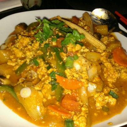Photo taken at Udom Thai Restaurant &amp; Bar by Idivinia F. on 3/12/2012