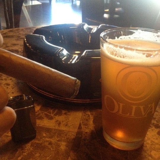 Photo taken at Crown Cigars and Ales by Daniel S. on 8/11/2012