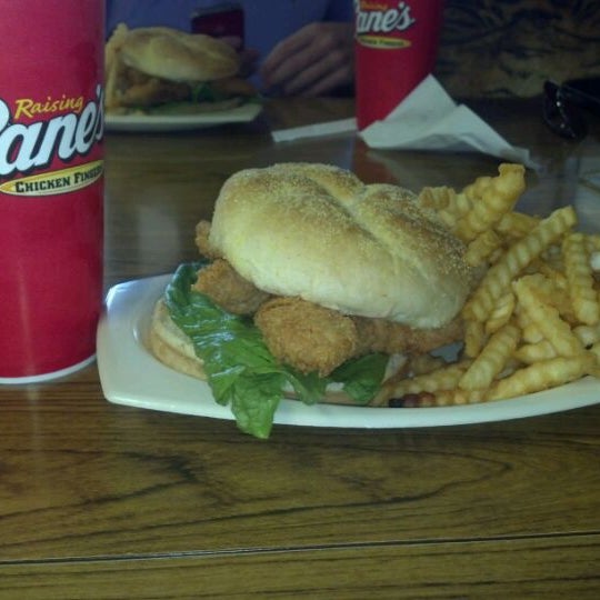 Photo taken at Raising Cane&#39;s Chicken Fingers by Emily R. on 4/20/2012