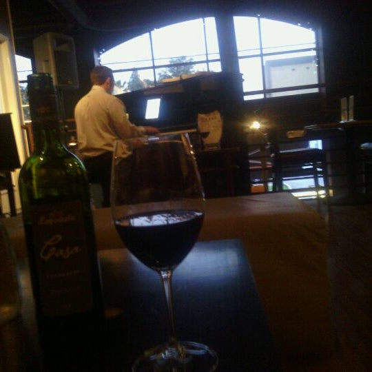 Photo taken at Left Coast Wine Bar by Mary Lynn D. on 4/10/2012