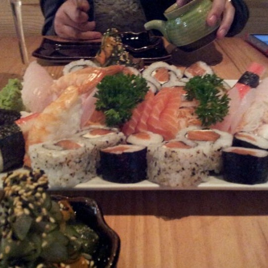 Photo taken at Sushi Yuzu by Rafael B. on 5/13/2012