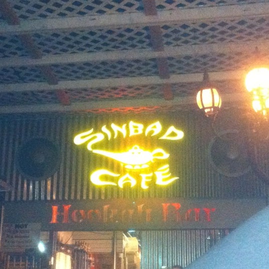 Photo taken at Sinbad Cafe &amp; Hookah Bar by April T. on 3/10/2012