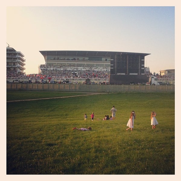 Photo taken at Epsom Downs Racecourse by Michael N. on 7/26/2012