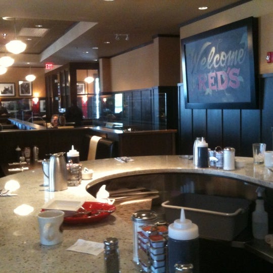 Photo taken at Red&#39;s Kitchen &amp; Tavern by Scott C. on 5/21/2012