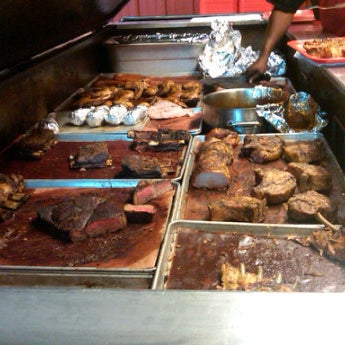 Photo taken at Cooper&#39;s Old Time Pit Bar-B-Que by Sam P. on 6/22/2012