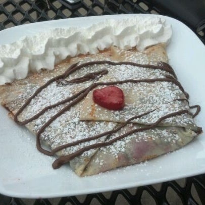 Photo taken at Coffee &amp; Crepes by Clarissa E. on 5/24/2012