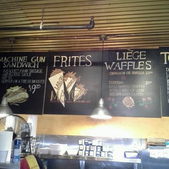 Photo taken at Bruges Waffles &amp; Frites by Adrian D. on 7/29/2012