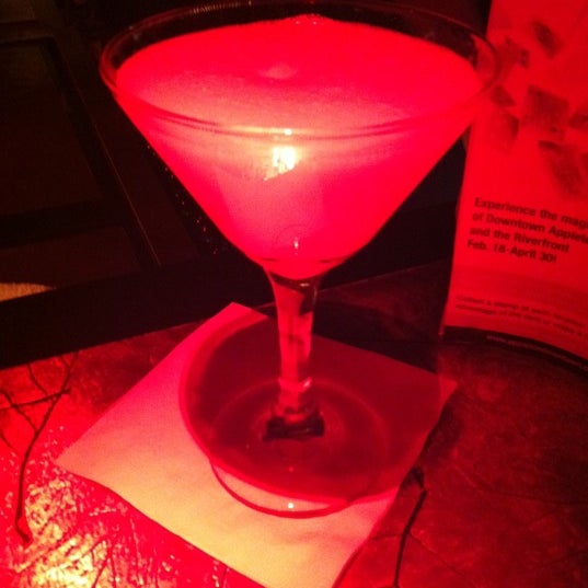 Photo taken at Deja Vu Martini Lounge by Chris W. on 3/9/2012