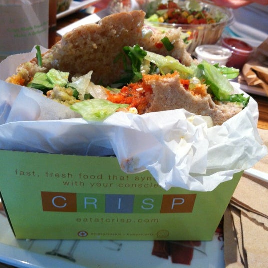 Photo taken at Crisp by Kendall T. on 8/8/2012