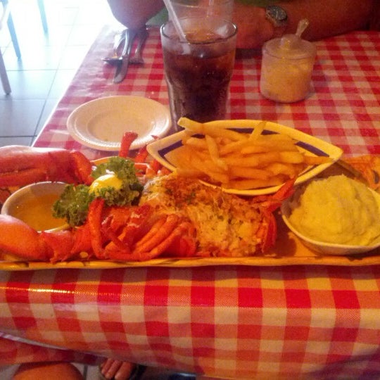 Photo taken at Lobster Pot Restaurant by Ben B. on 7/28/2012