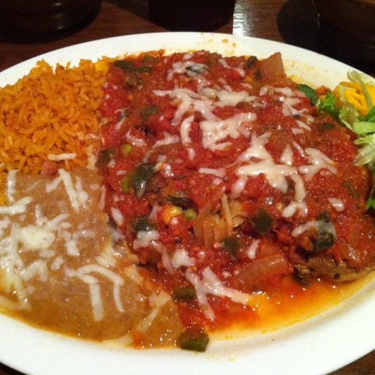 Photo taken at La Familia Mexican Restaurant by Joy O. on 8/8/2012