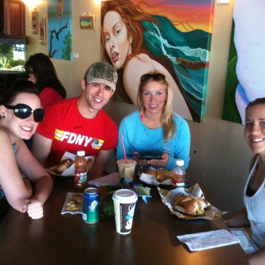 Photo taken at Juice N Java Cafe by Brittany D. on 3/26/2012