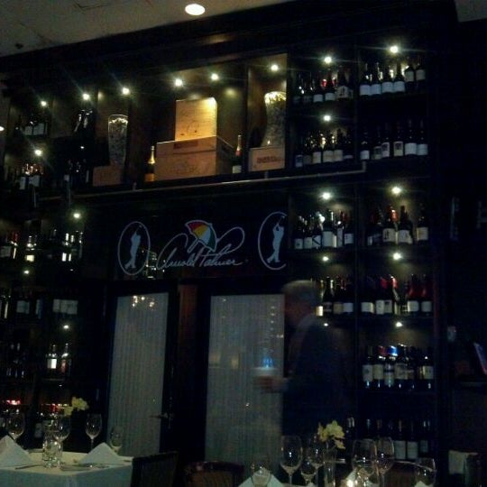 Photo taken at Vines Grille &amp; Wine Bar by Kat M. on 3/24/2012