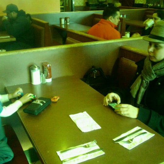 Photo taken at Sunset Park Diner &amp; Donuts by Theresa Y. on 2/3/2012