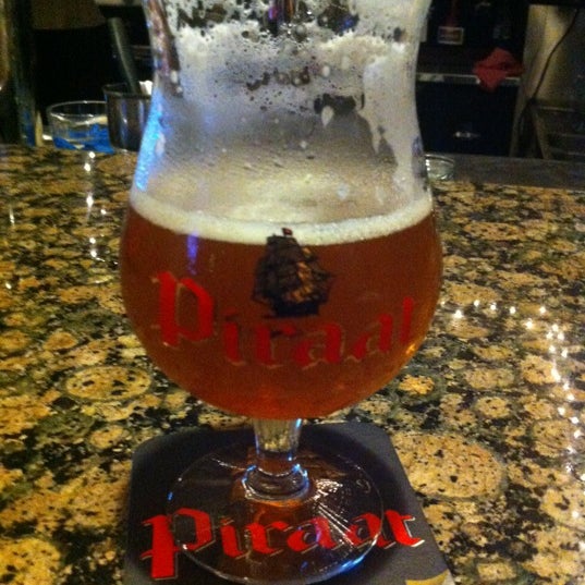 Photo taken at The Globe Belgian Gastropub by Shawn S. on 4/5/2012