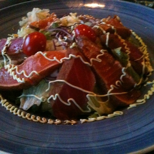 Photo taken at East Japanese Restaurant (Japas 27) by Jenny H. on 4/12/2012