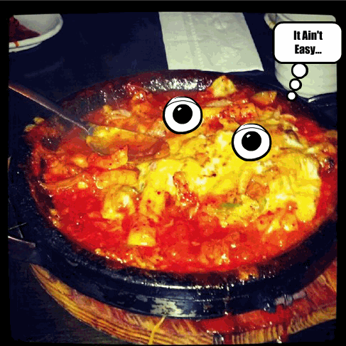 Order the Kimchee Jaeyook Dduk Boki with Cheese (or just "the Cheese") (Googly eyes not included).