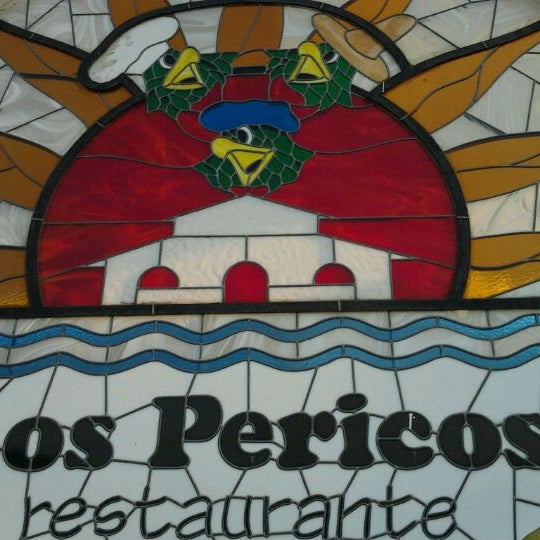 Photo taken at Los Pericos by Ever O. on 5/11/2012