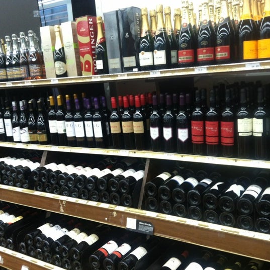 Photo taken at Grand Wine &amp; Liquors by Brian M. on 7/8/2012