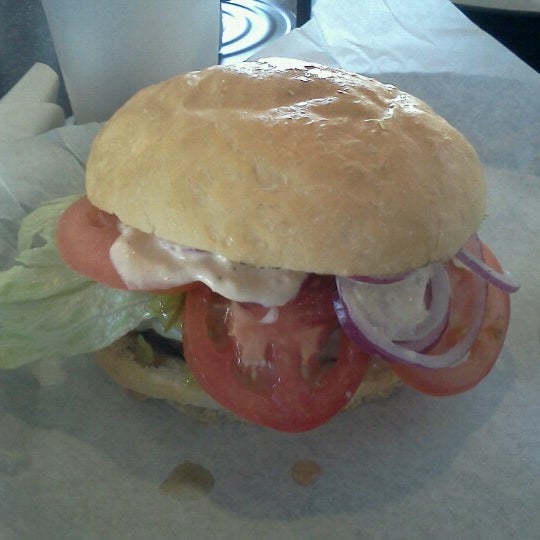 Photo taken at Dave &amp; Tony&#39;s Premium Burger Joint by Jeff R. on 6/28/2012