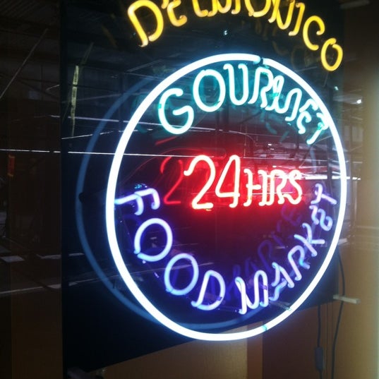 Photo taken at Delmonico Gourmet Food Market by Bert C. on 8/20/2012