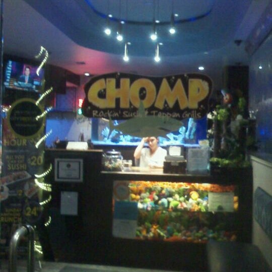 Photo taken at Chomp Sushi &amp; Teppan Grill by Victoria P. on 3/7/2012