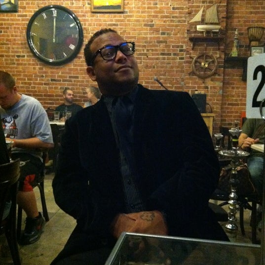 Photo taken at Sinbad&#39;s Hookah Bar by Liz B. on 8/3/2012