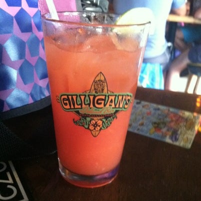 Photo taken at Gilligan&#39;s Island Bar and Grill by DocnRutter S. on 7/29/2012