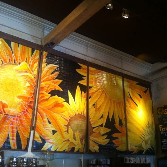 Photo taken at Sunflower Caffé Espresso &amp; Wine by John L. on 4/14/2012