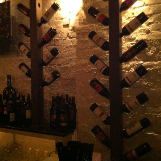 Photo taken at La Cava Wine Bar by Stephanie A. on 2/23/2012