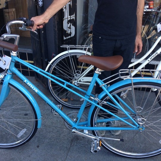 Photo taken at Manifesto Bicycles by Christina d. on 7/29/2012