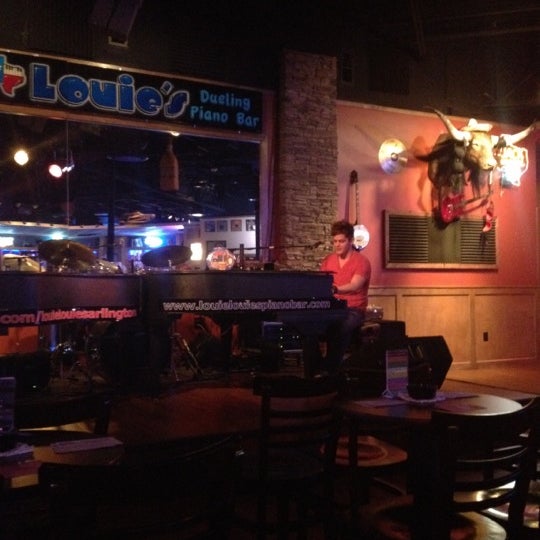 Photo taken at Louie Louie&#39;s Dueling Piano Bar by Krysten C. on 2/24/2012
