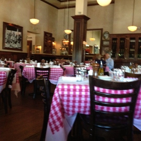 Photo taken at Maggiano&#39;s Little Italy by Brittany Q. on 5/28/2012