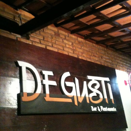 Photo taken at Degusti Bar &amp; Restaurante by Renato L. on 6/10/2012