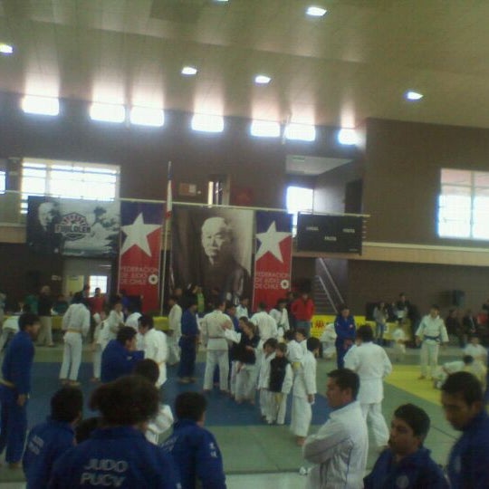 Photo taken at Polideportivo Sergio Livingstone by Angela S. on 4/28/2012